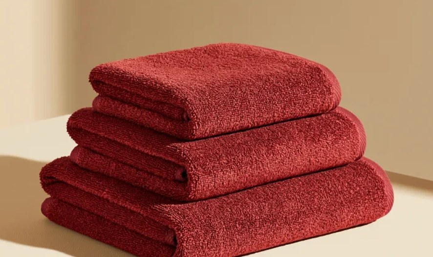 Stack of deep red folded towels