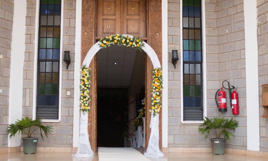 Hotel entrance decorated with flowers for an opening